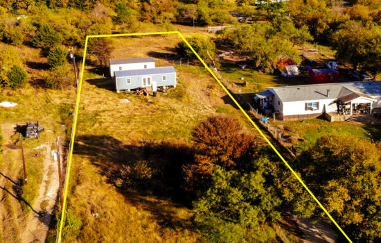 0.93 Acres- Unrestricted in Cleburne with Two Tiny homes and Utilities